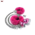 nixie-metal-butt-plug-with-soft-furry-cuff-medium-pink-metallic